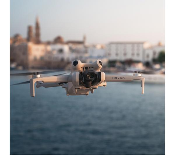 DJI Mini 4 Pro Drone RC in Smart Grey, featuring advanced obstacle sensing and 4K HDR video.