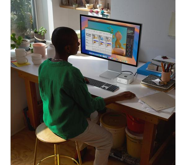 APPLE Mac mini M4 Pro Silver featuring a sleek, compact design and advanced processing capabilities.